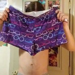 Purple shorts with sunglass print